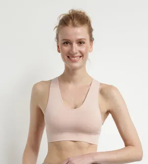 Seamless bra in almond pink Dim Sport