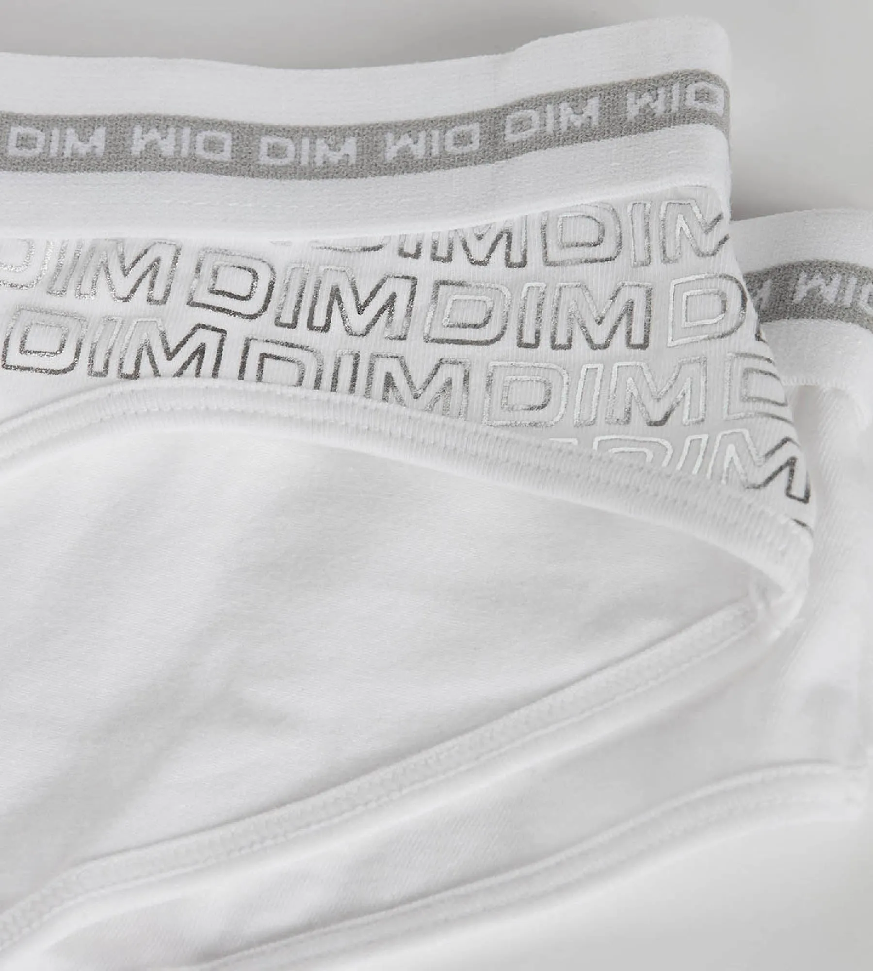 Shorty fille coton stretch Blanc avec impressions argentées Dim Sport